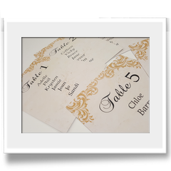 Table number cards with swirly gold pattern