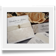 Hand Crafted with embossed effect and ribbon invitation