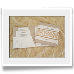 Hand Crafted with Gold embossed effect and ribbon invitation