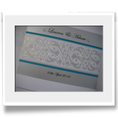 Hand Crafted with Silver embossed effect and ribbon invitation