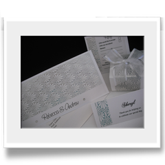 Hand Crafted with embossed effect and ribbon invitation