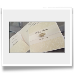 Hand Crafted with embossed effect and ribbon invitation